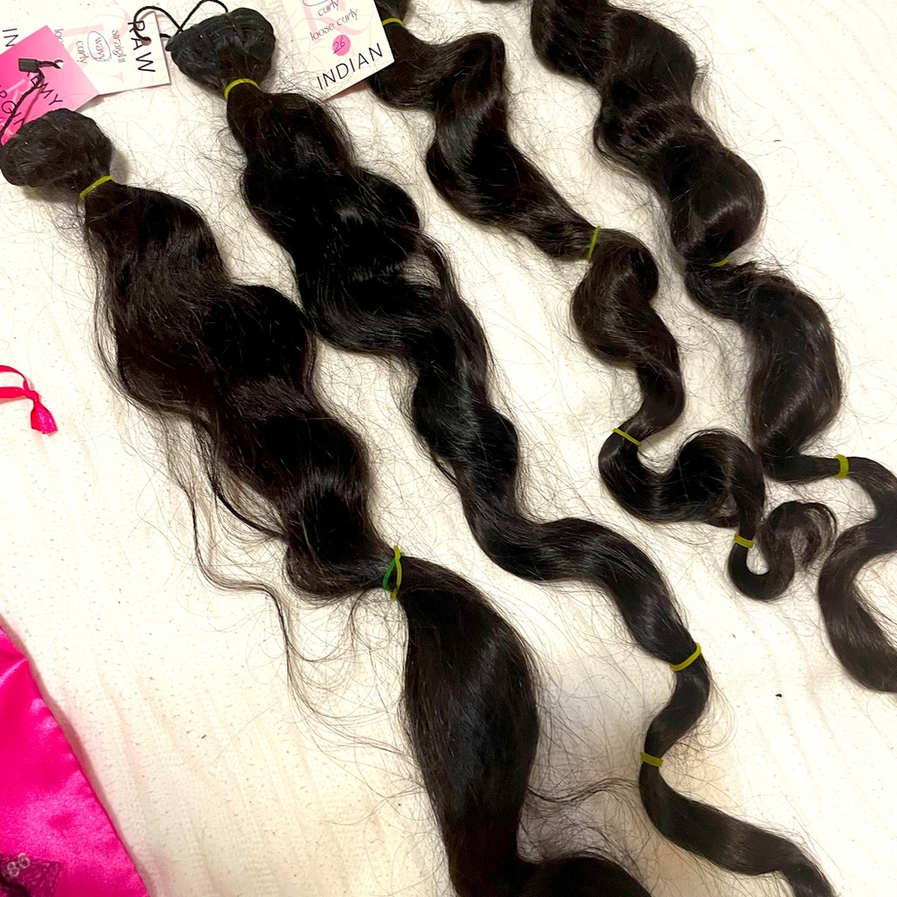 Raw Indian hair. Virgin Remy. Wavy. 26 and 28 inch. 4 pieces